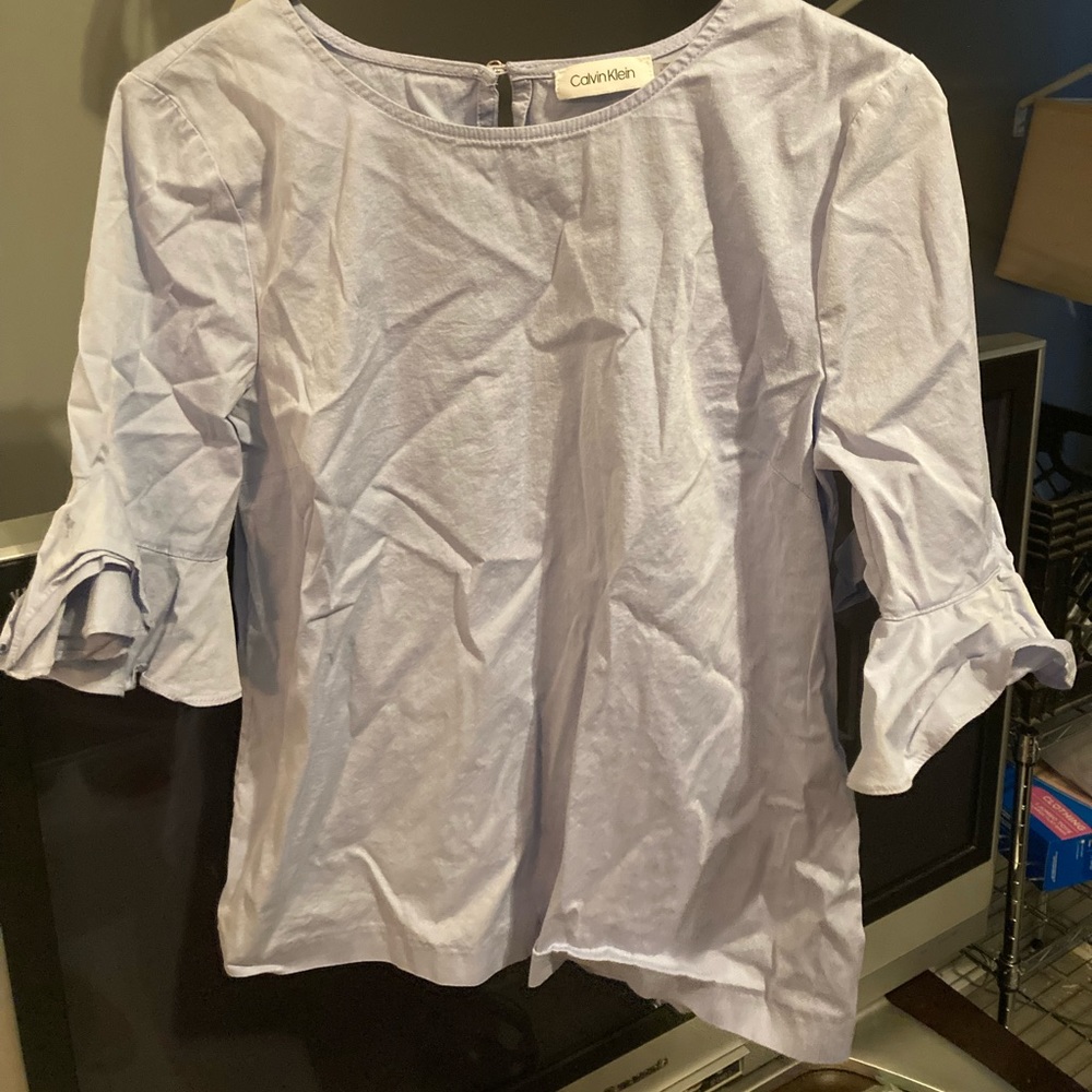 Light blue ruffle top